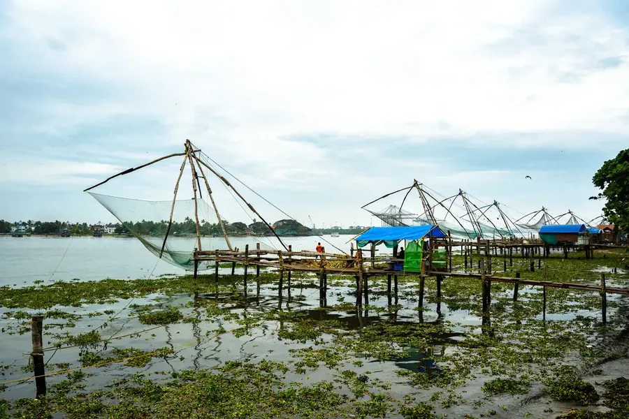 Chinese fishing nets lining the waterfront pier at Fort Kochi, Kerala